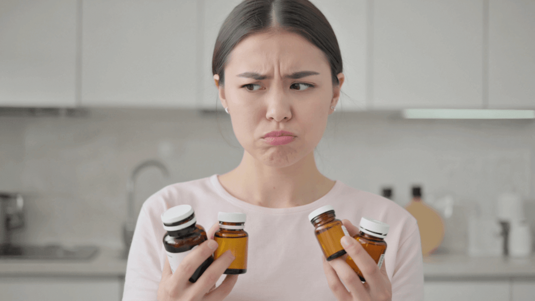 donna dubbiosa sull'utilizzo di intregratori alimentari generici